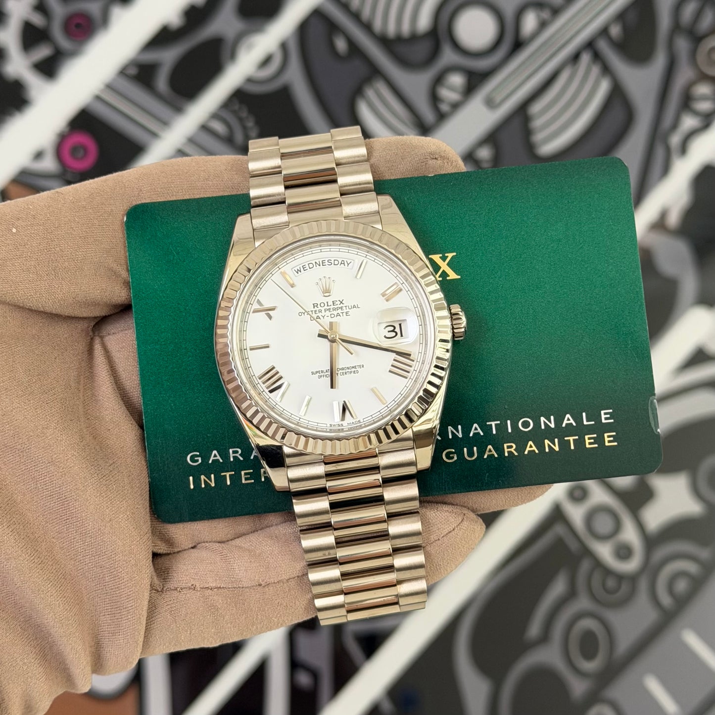 Rolex DD40 White Gold White Roman Dial
ref. 228238