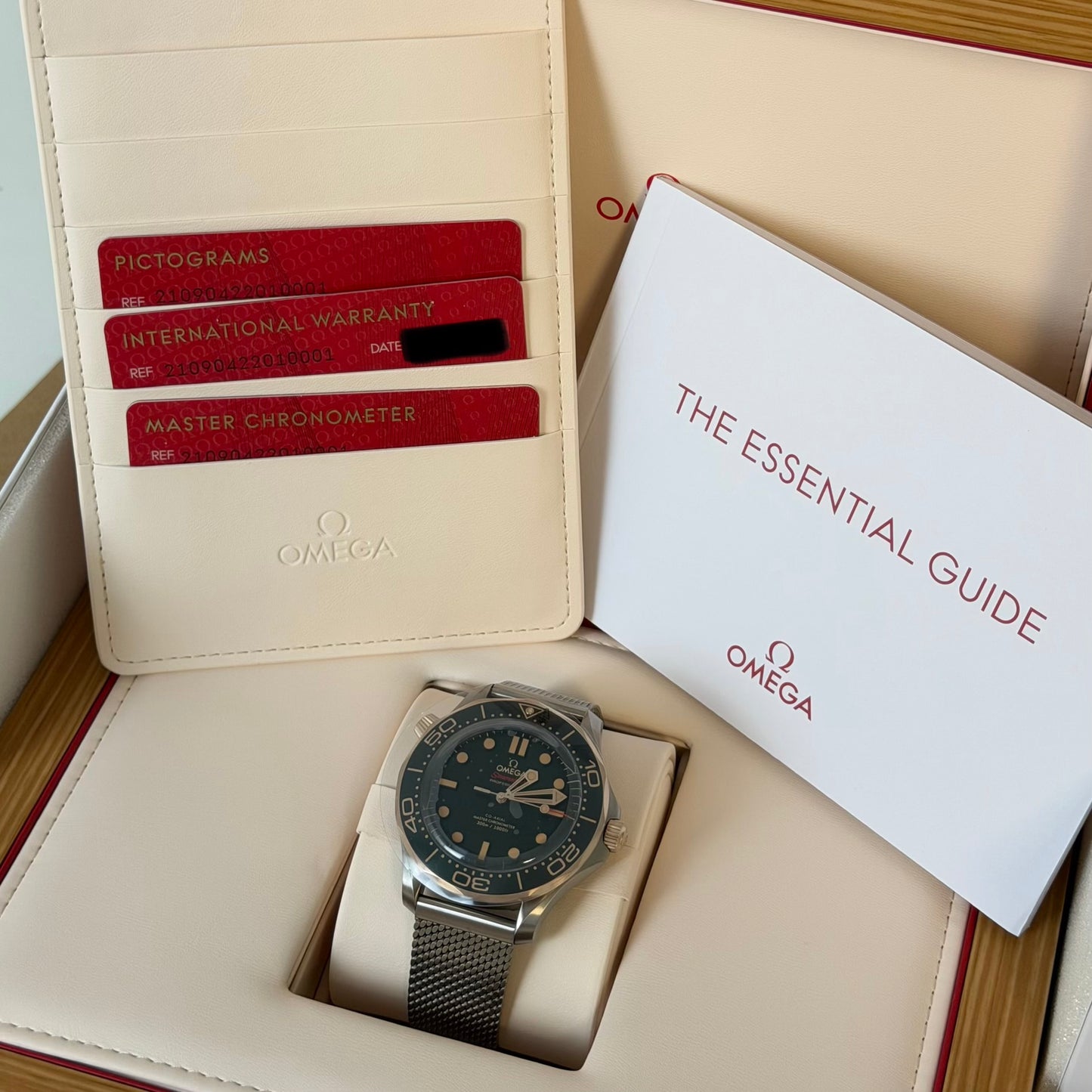 NEW Omega NTTD Bronze Gold Green Dial 210.90.42.20.10.001
