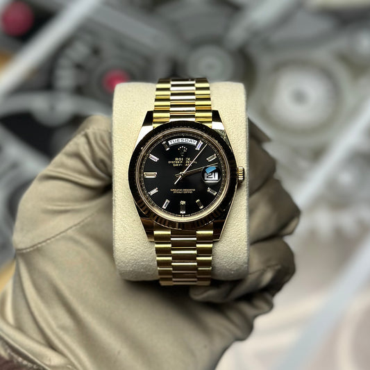 Rolex Day Date 40 Yellow Gold Black Diamond Dial 228238